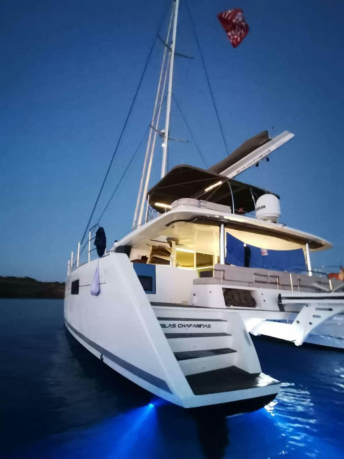 a boat on the water aboard ISLAS CHAFARINAS  Yacht for Charter