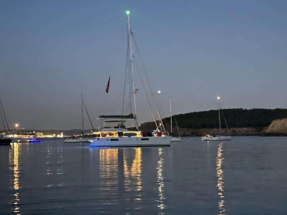 a boat on the water aboard ISLAS CHAFARINAS  Yacht for Charter