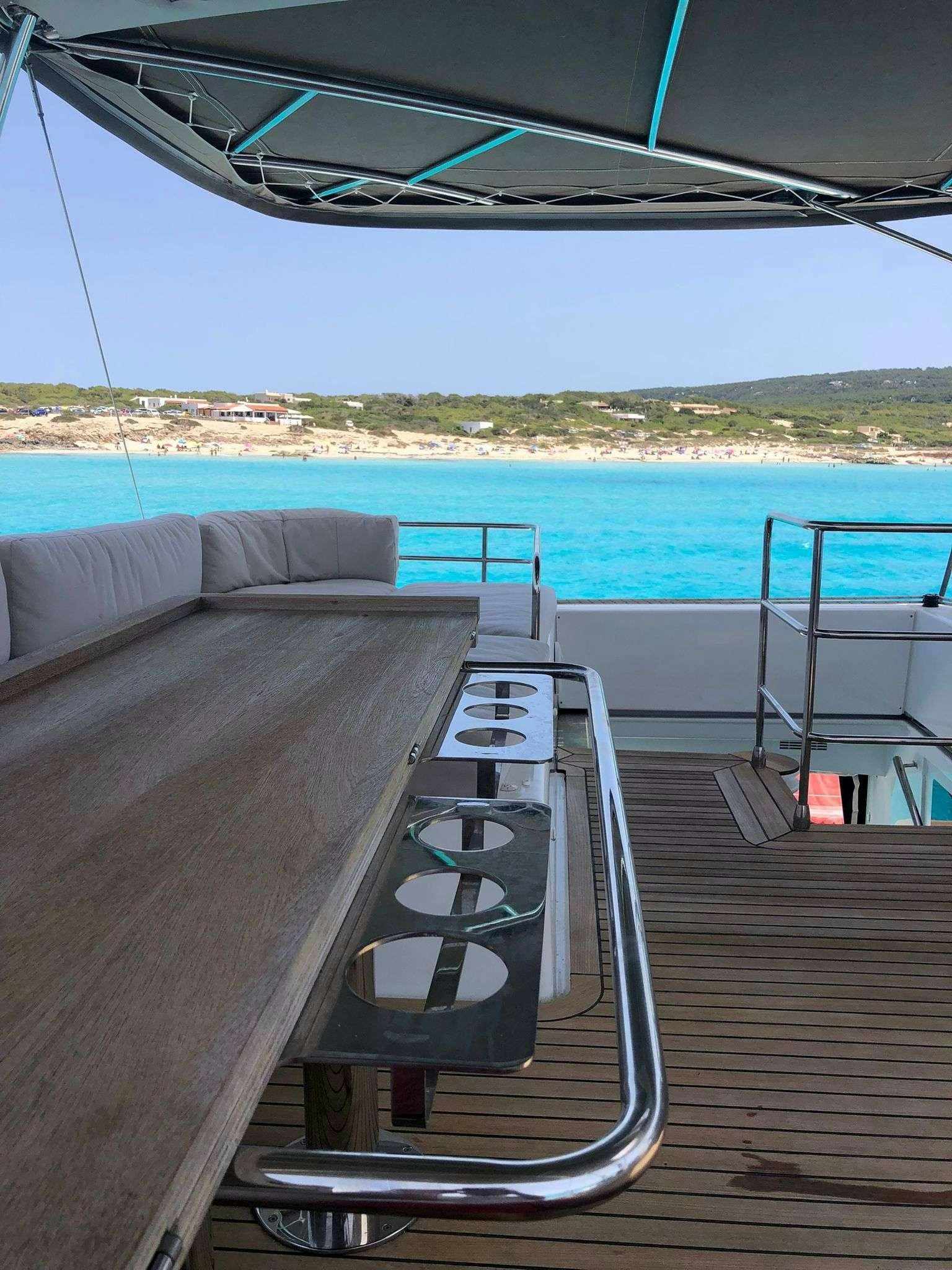 a boat on the water aboard ISLAS CHAFARINAS  Yacht for Charter