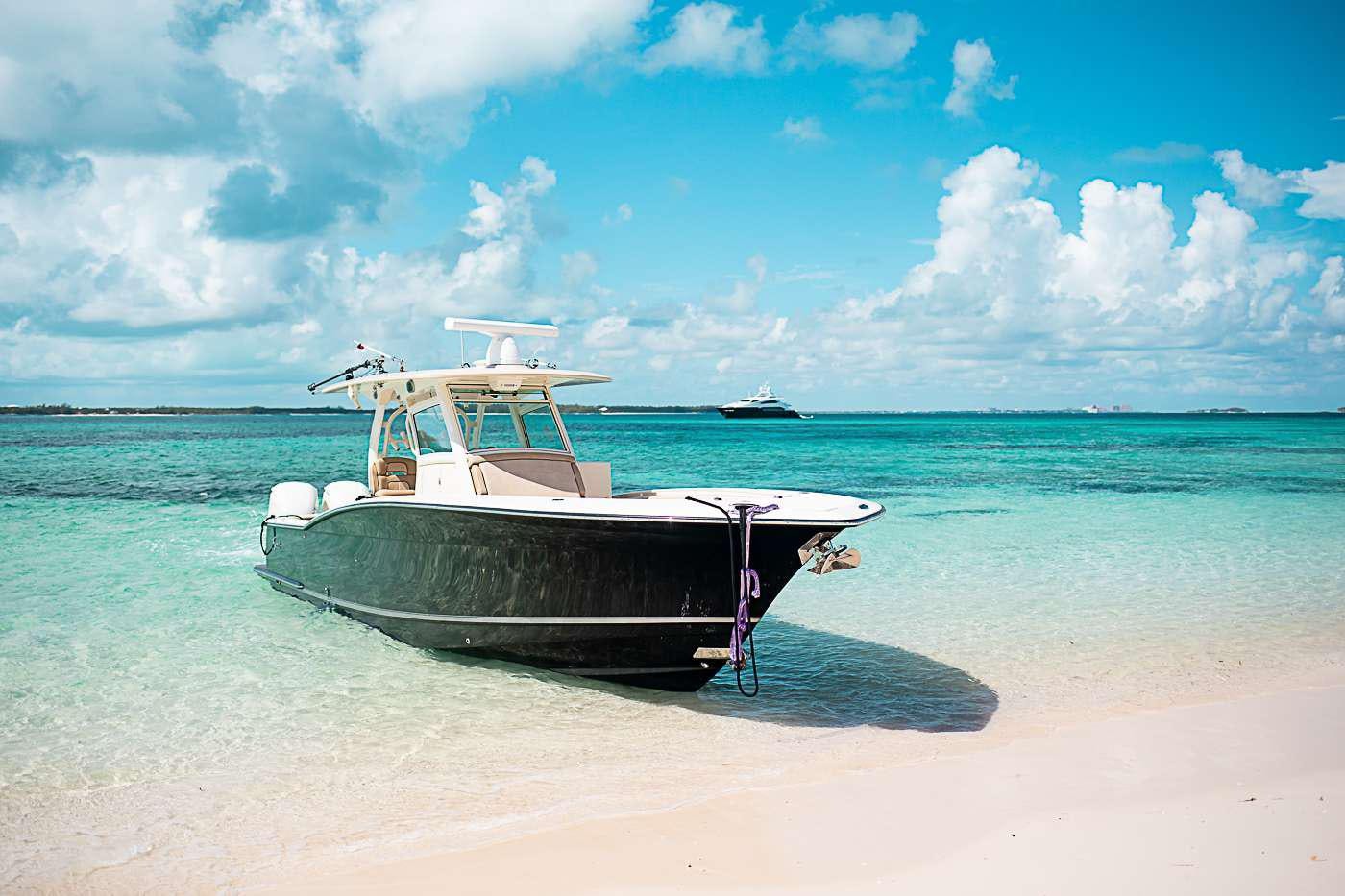 a boat on a beach aboard ACACIA Yacht for Charter