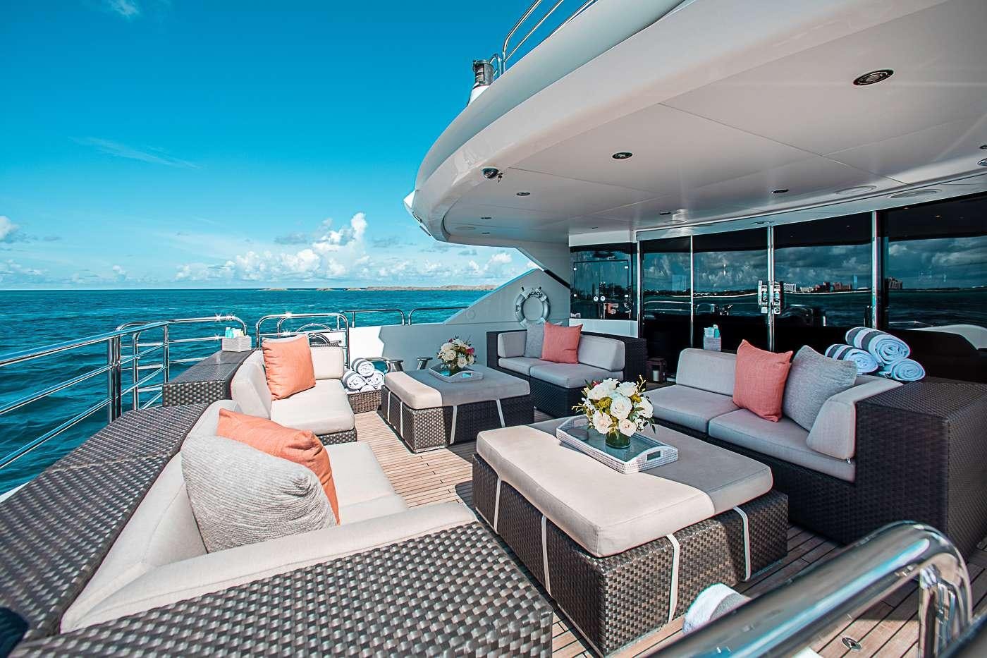 a large living room with a large ocean view aboard ACACIA Yacht for Charter