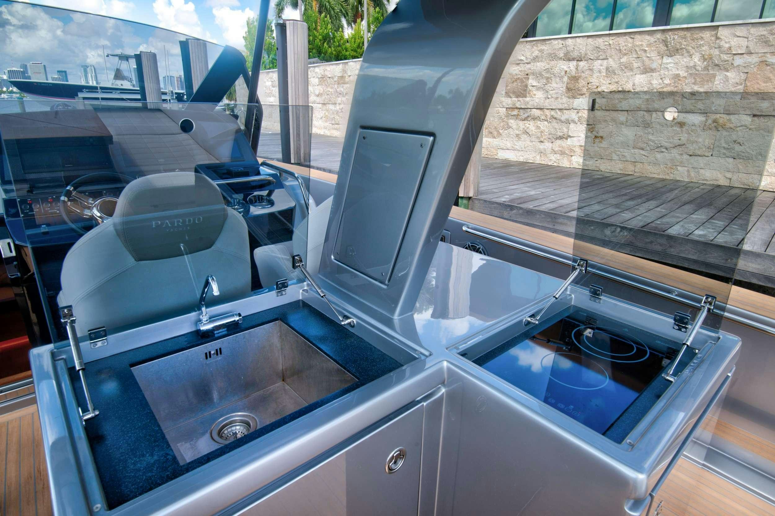 a large silver sink in a kitchen aboard PARDO 50 Yacht for Charter