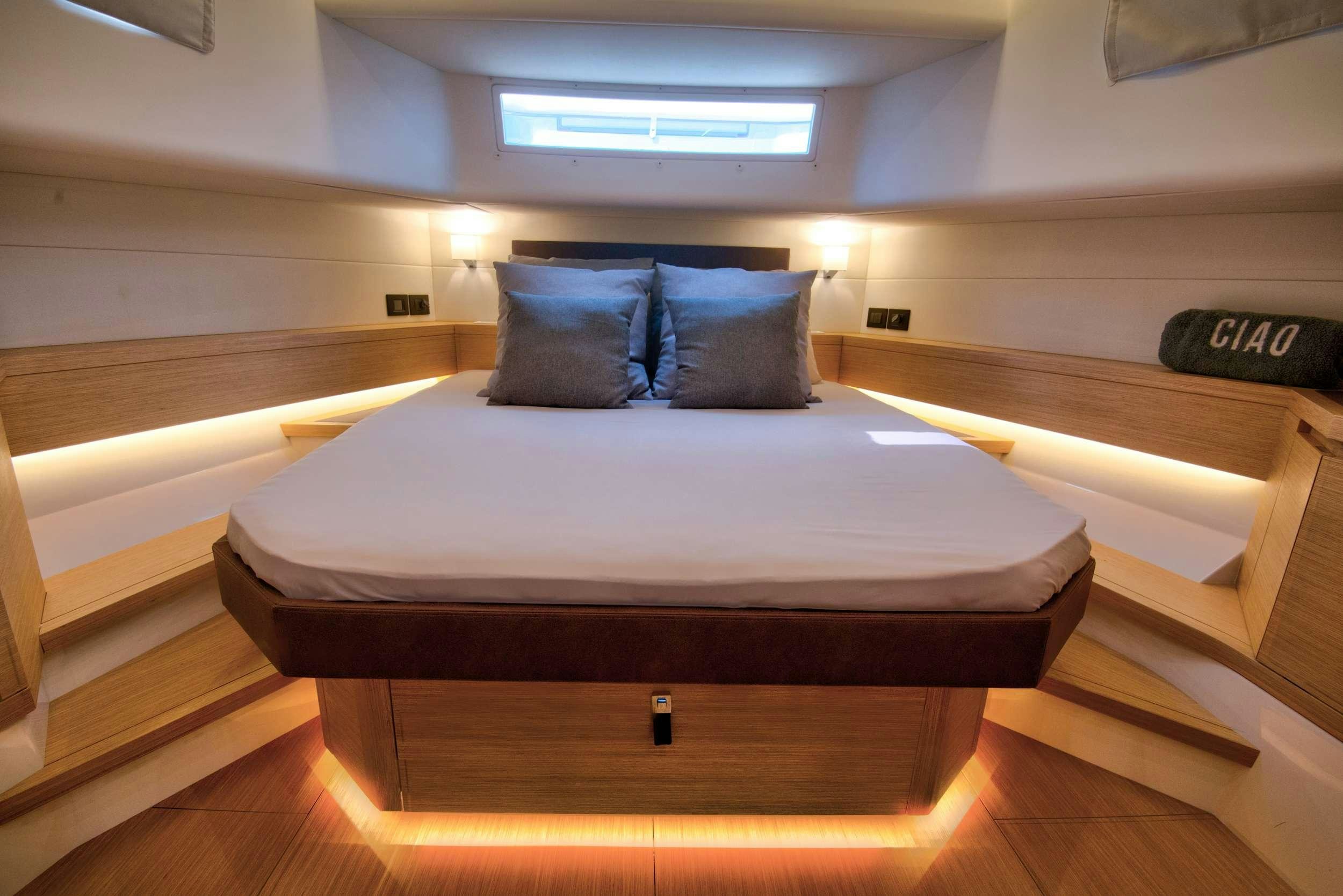 a bed in a room aboard PARDO 50 Yacht for Charter