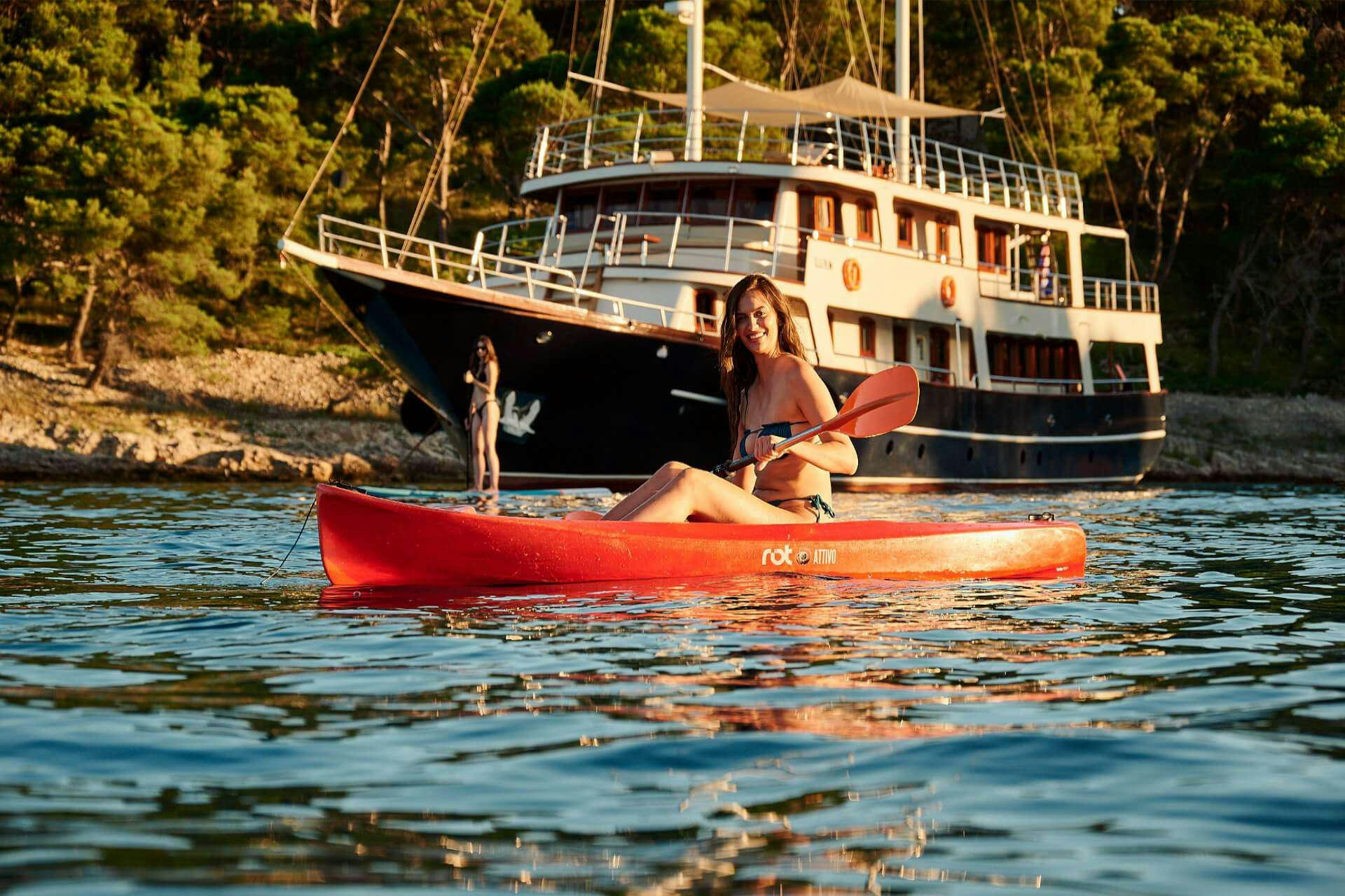 a person sitting on a boat aboard LUNA Yacht for Charter