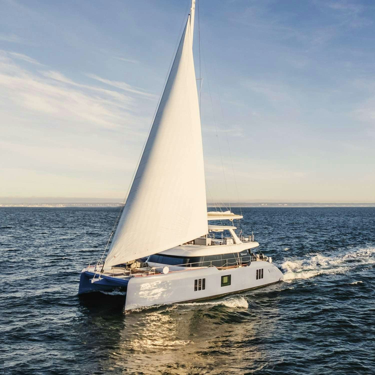 a white sailboat on the water aboard AGATA BLU Yacht for Charter