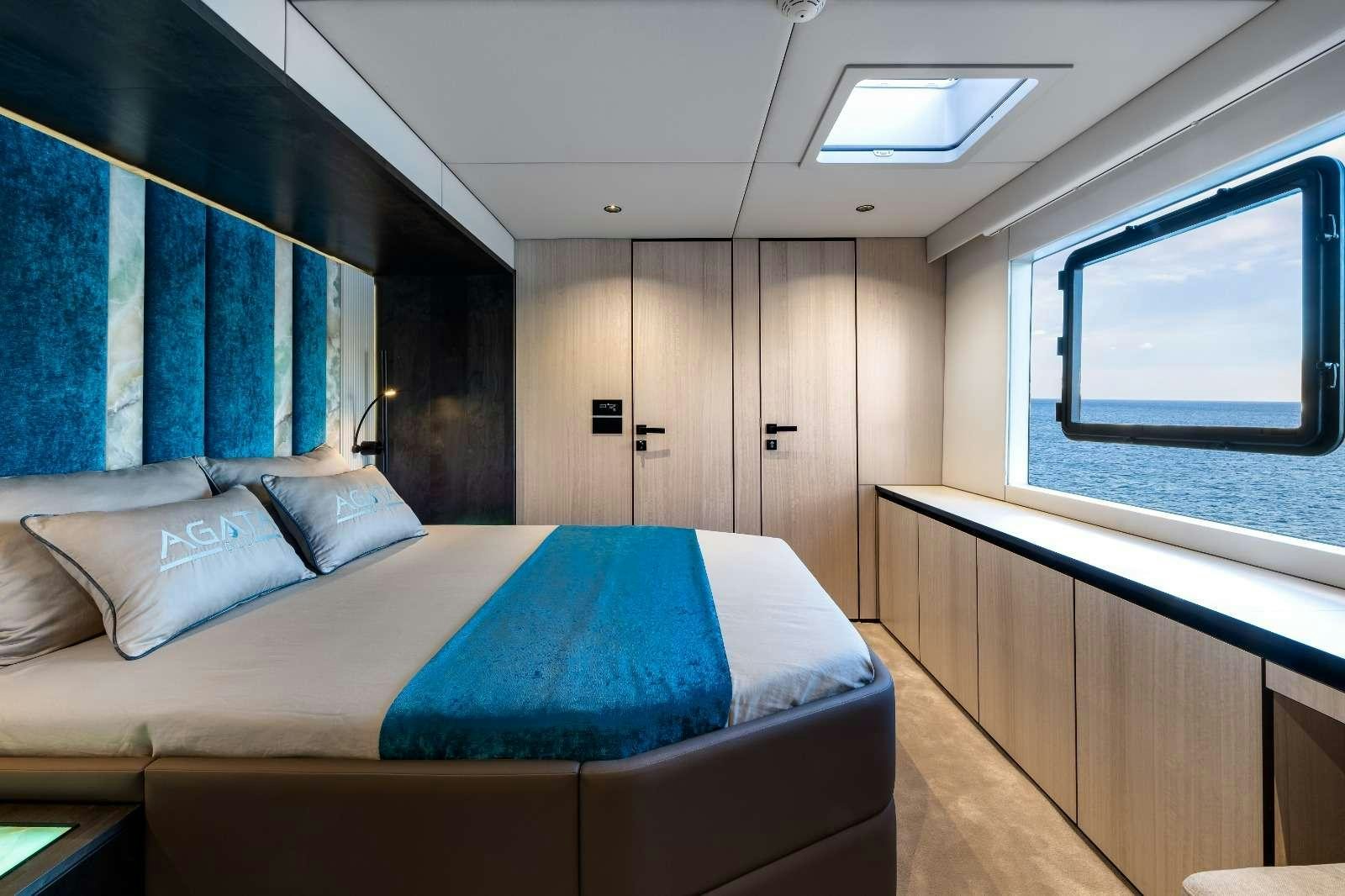 a bed in a room aboard AGATA BLU Yacht for Charter