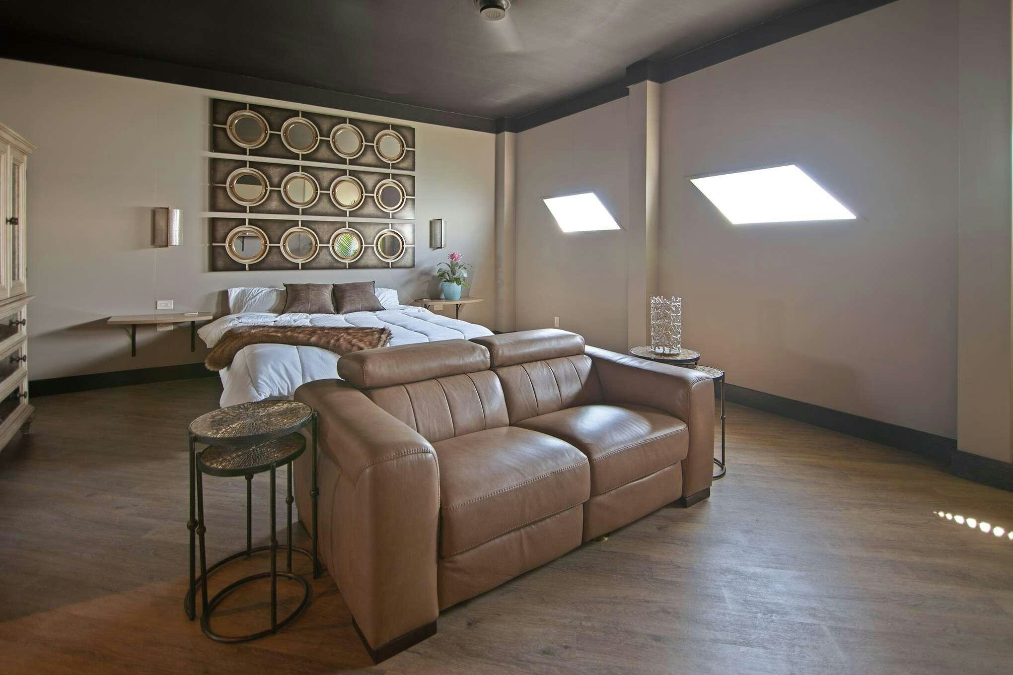 a living room with a couch and a table aboard MANSION YACHT Yacht for Charter