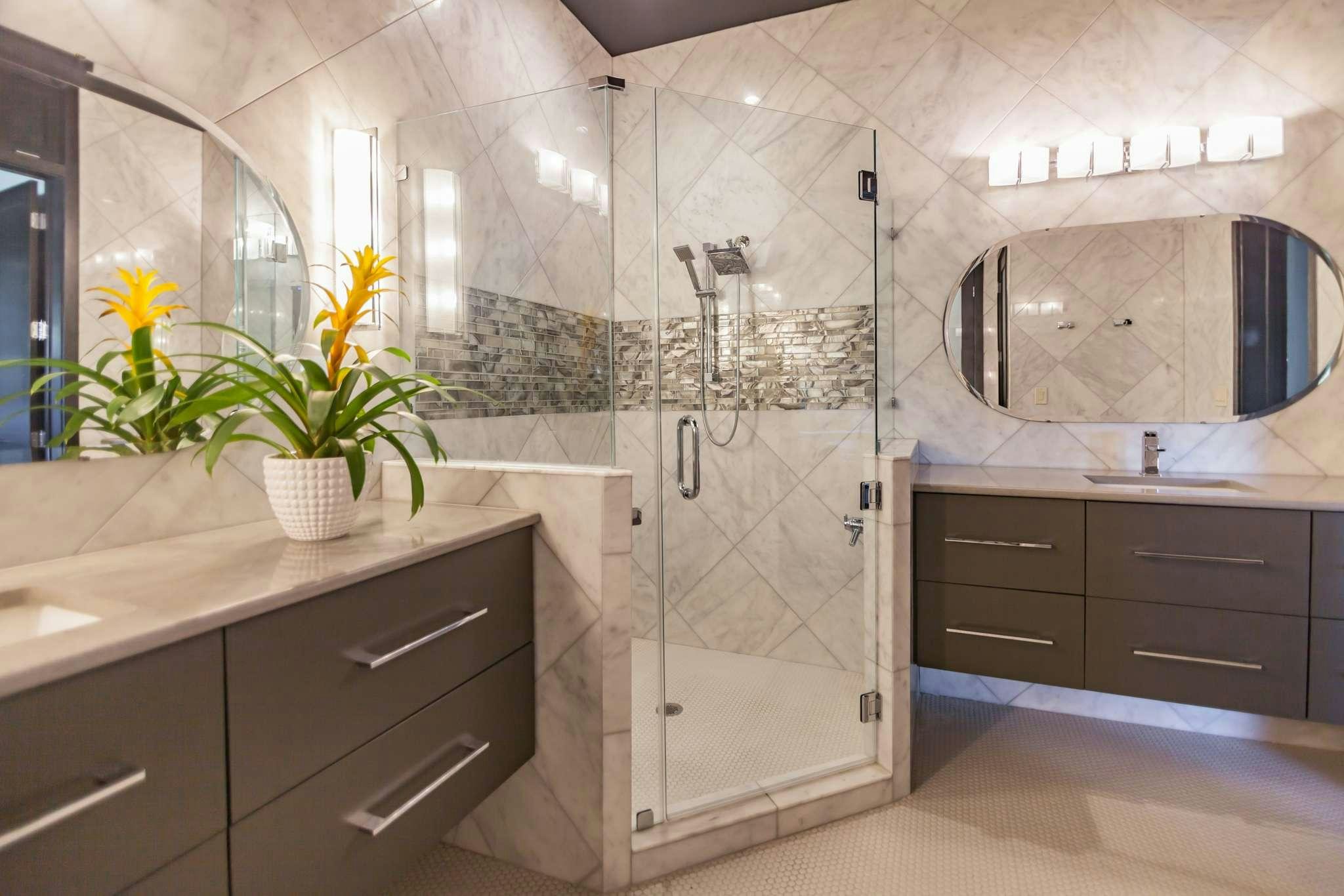a bathroom with a glass shower aboard MANSION YACHT Yacht for Charter
