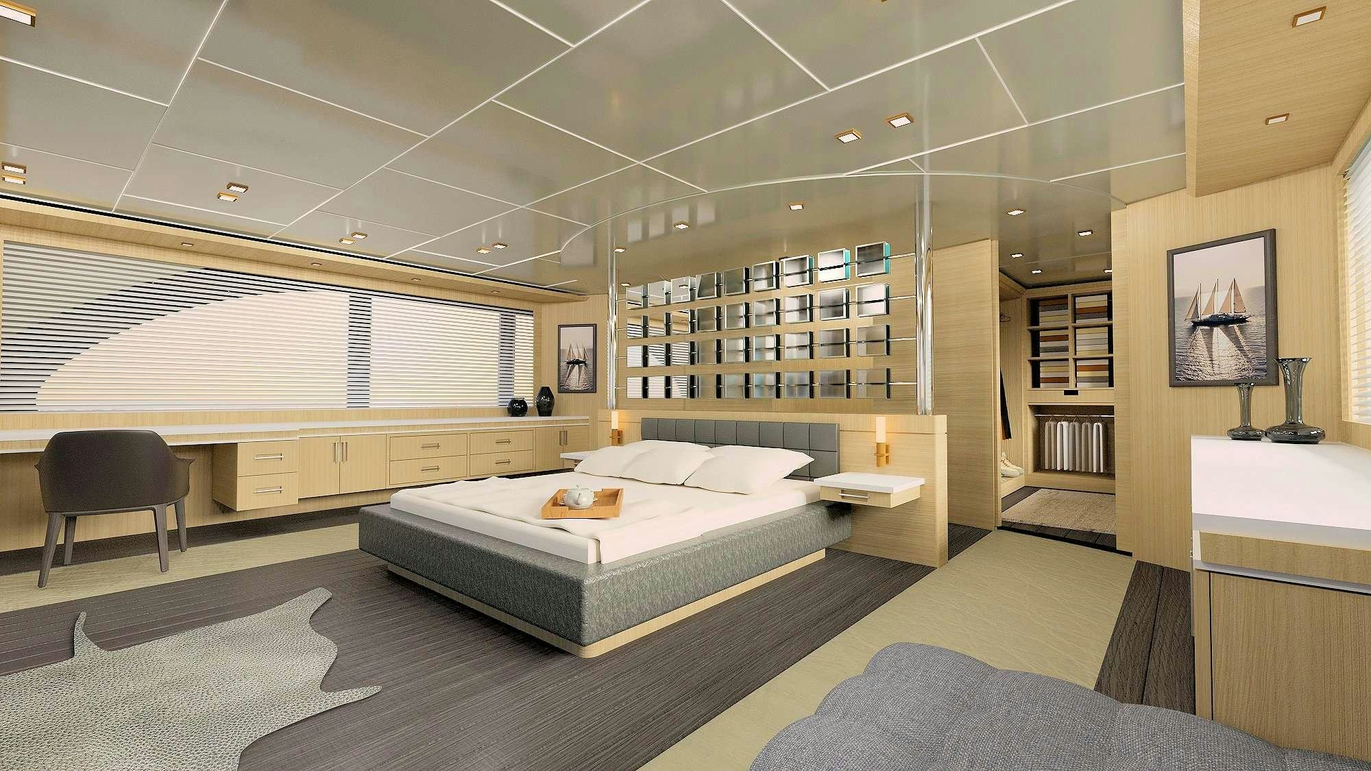 a room with a bed and a desk aboard PRINCESS MELDA Yacht for Charter