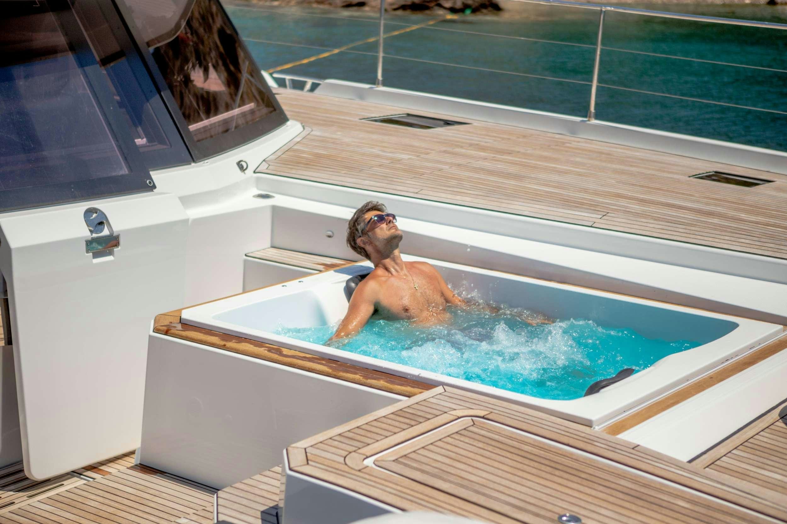 a person in a pool aboard ALENA Yacht for Charter
