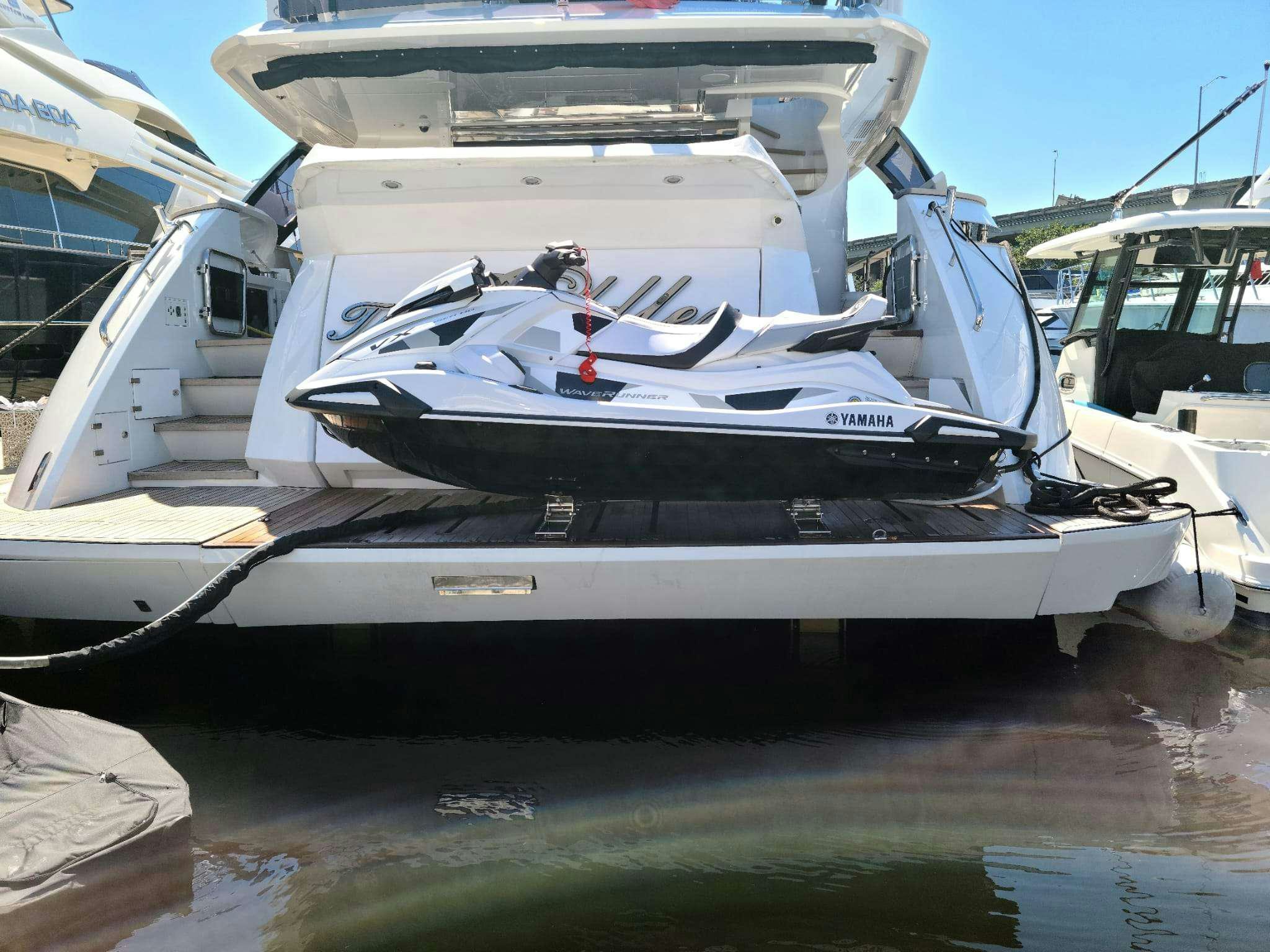 a boat docked on a dock aboard THE PEDDLER Yacht for Charter