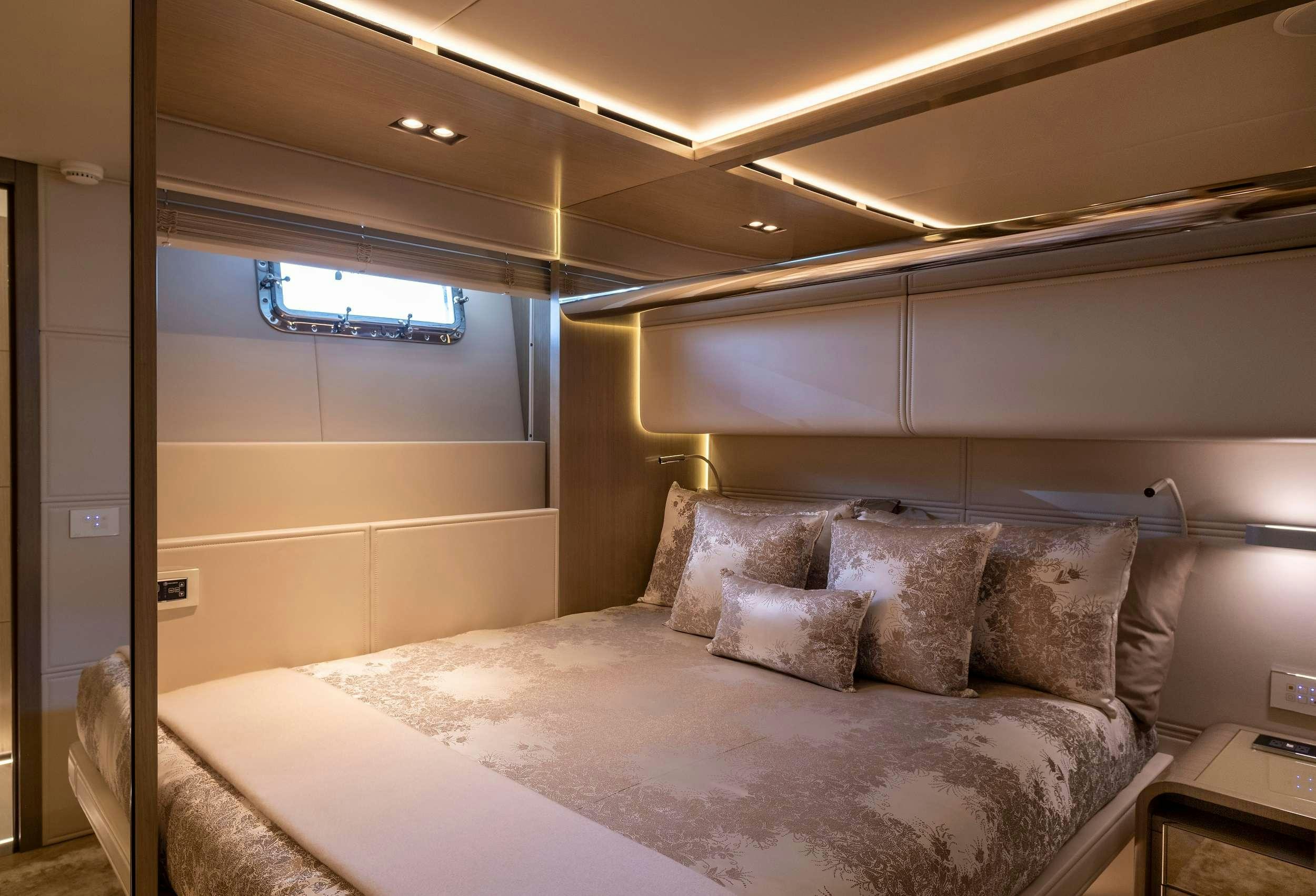 a bed in a room aboard THE PEDDLER Yacht for Charter