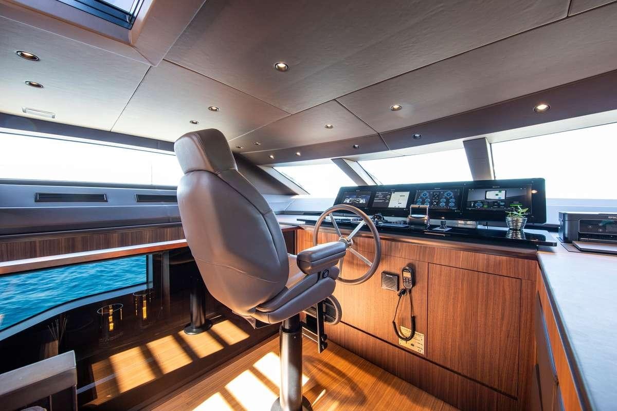 a chair in a room aboard SEVEN Yacht for Charter