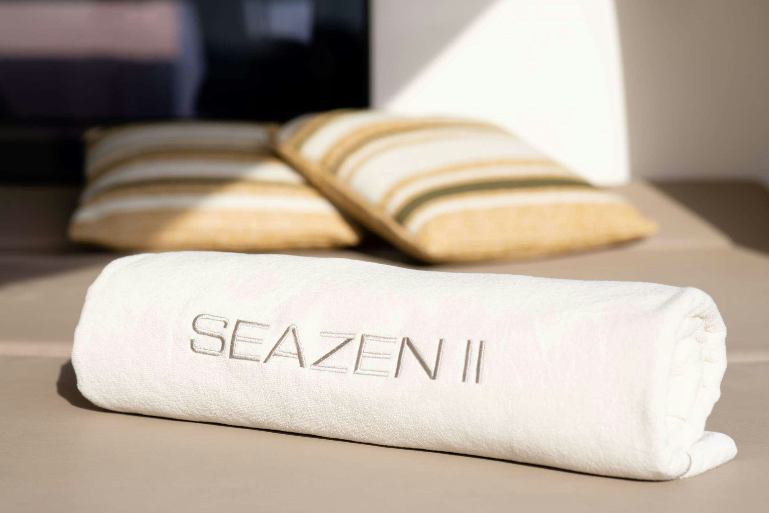a white napkin with a word on it aboard SEAZEN II Yacht for Charter