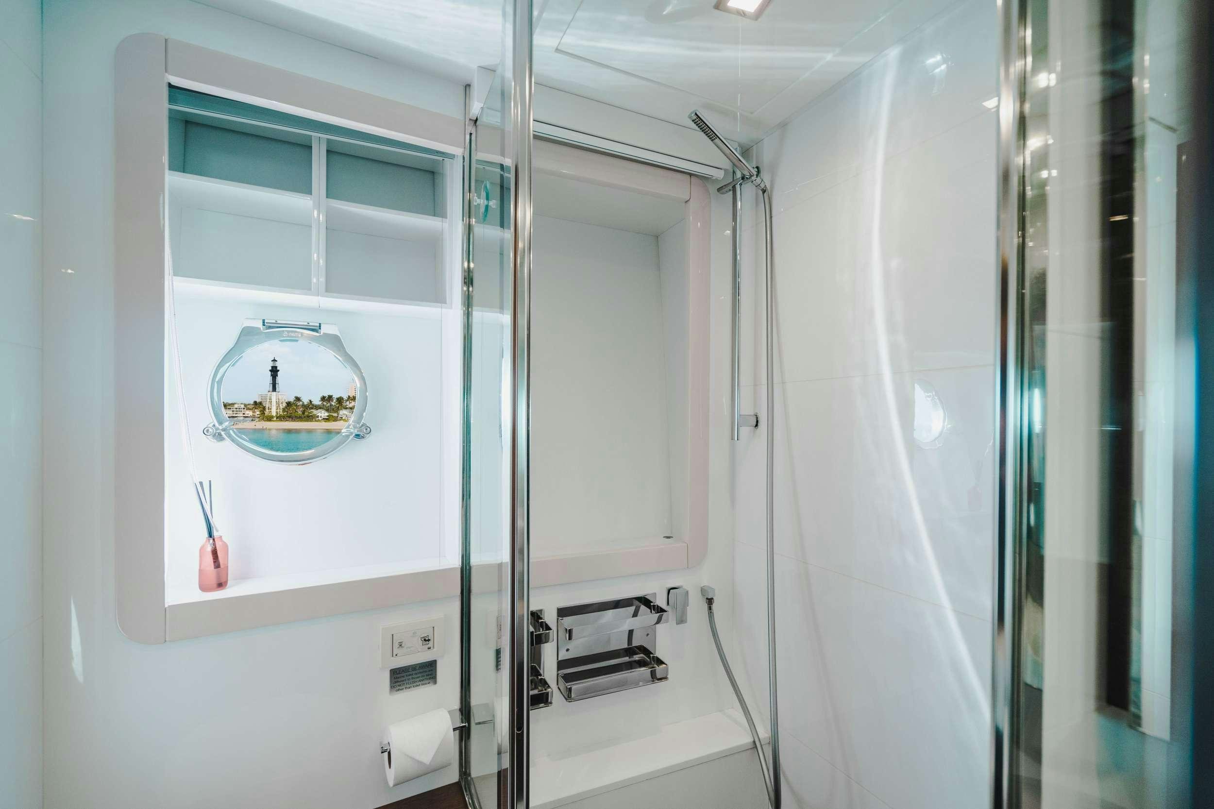 a medical room with a glass case aboard MIRABILIS Yacht for Charter