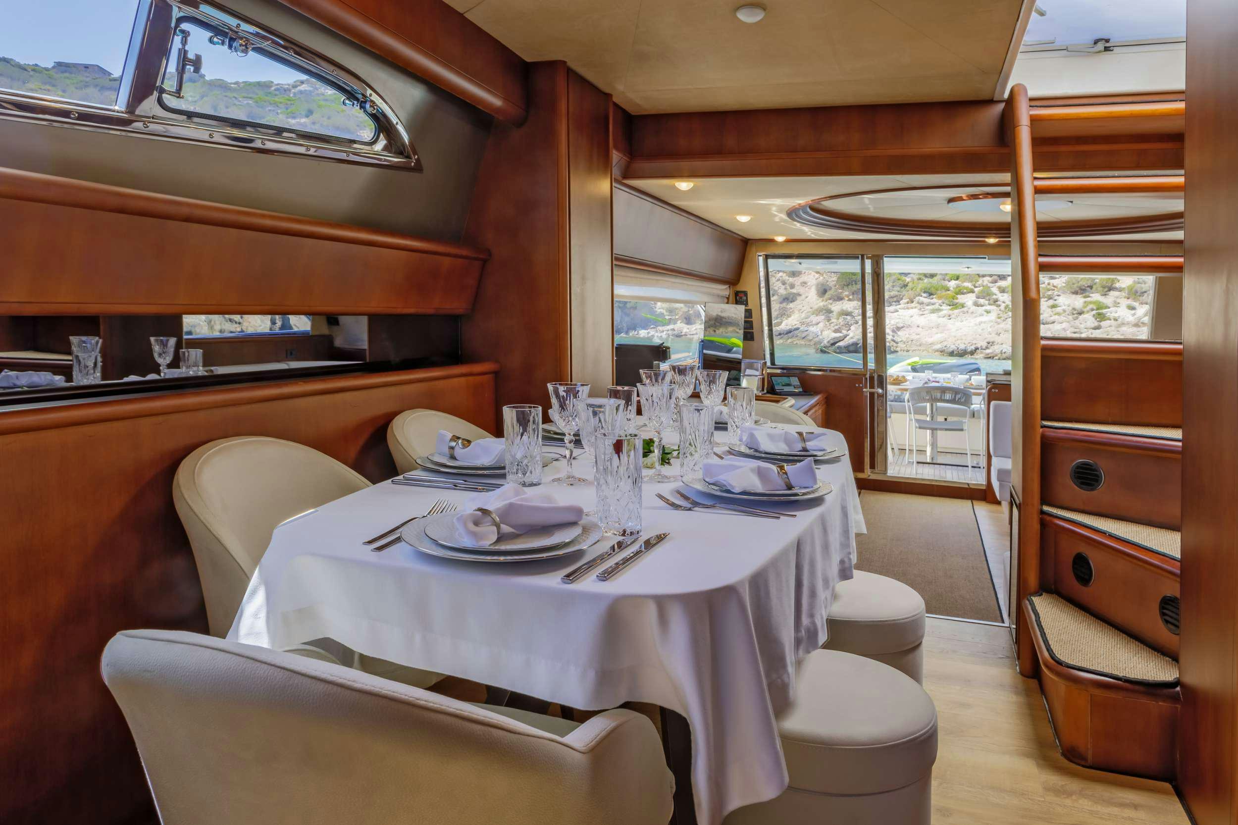 a dining table set for a meal aboard MY WAY Yacht for Charter