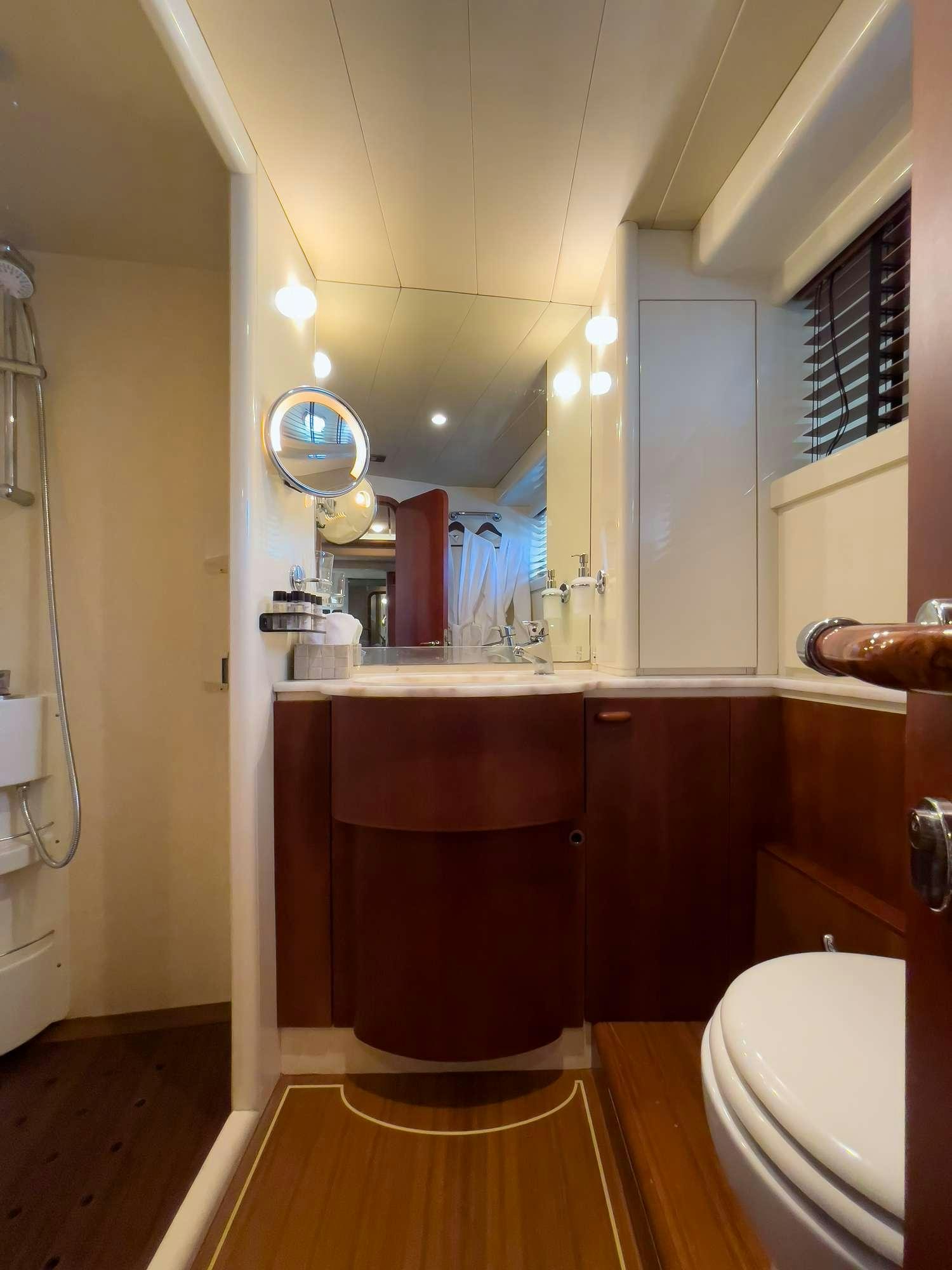 a bathroom with a sink and a toilet aboard MY WAY Yacht for Charter