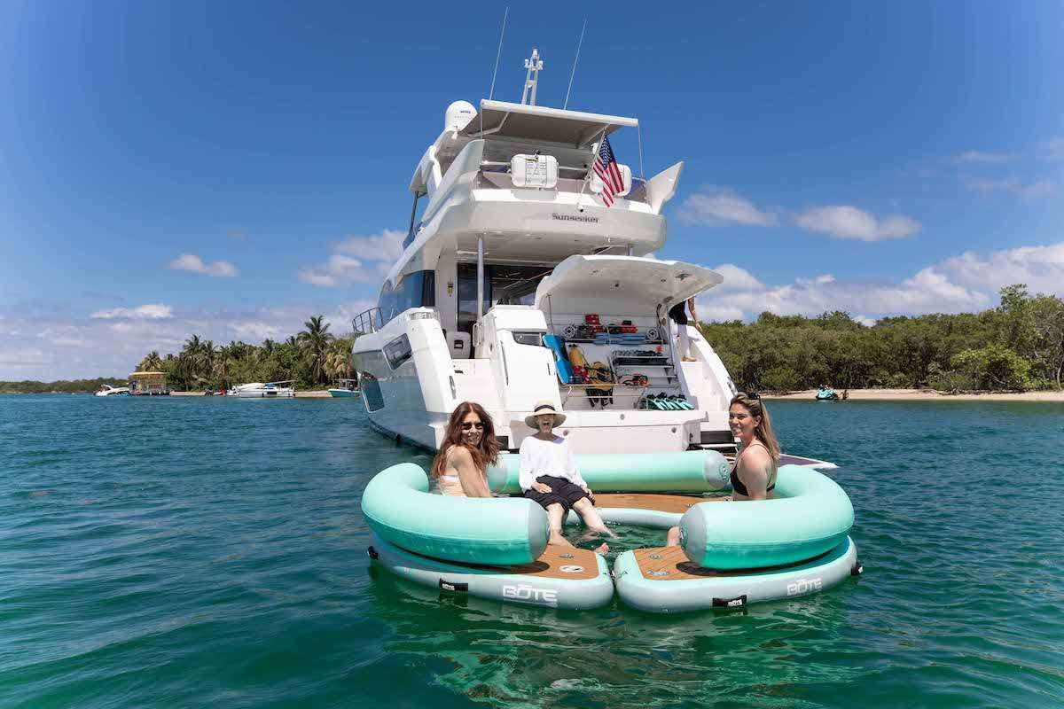 a group of people on a boat aboard LAGO PARADISE Yacht for Charter