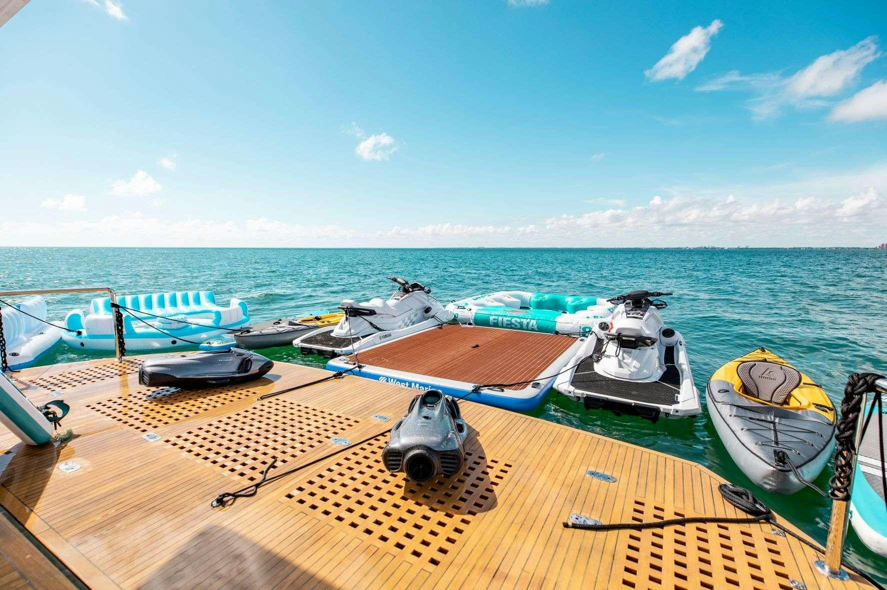 boats on a dock aboard FREEDOM Yacht for Charter