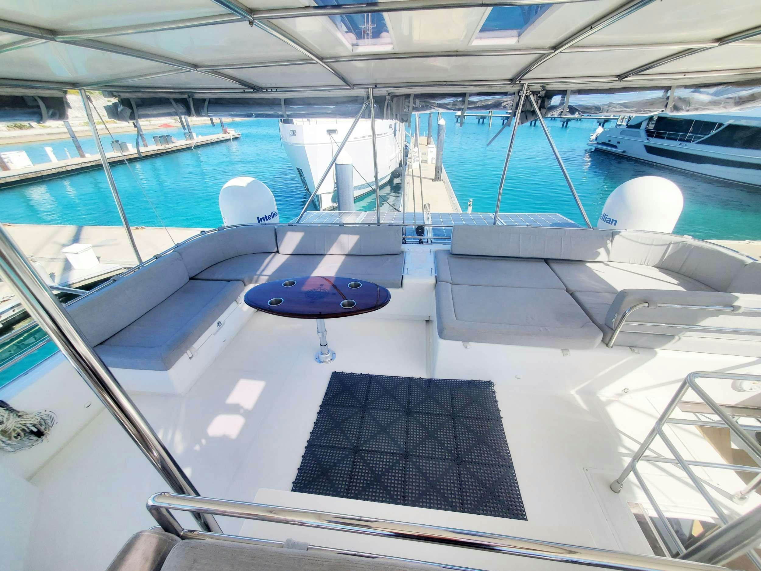 a large pool with several boats aboard BLUE CAT Yacht for Charter