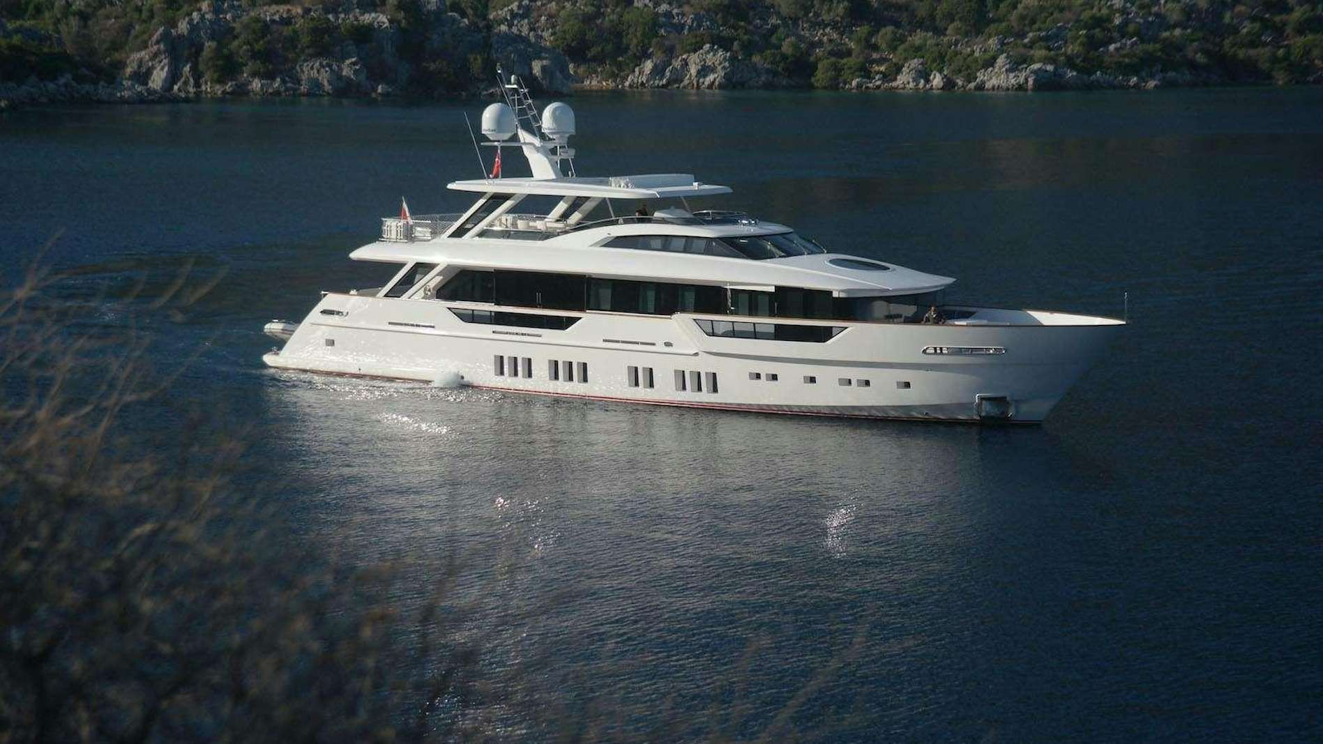 a white yacht on the water aboard REM Yacht for Charter