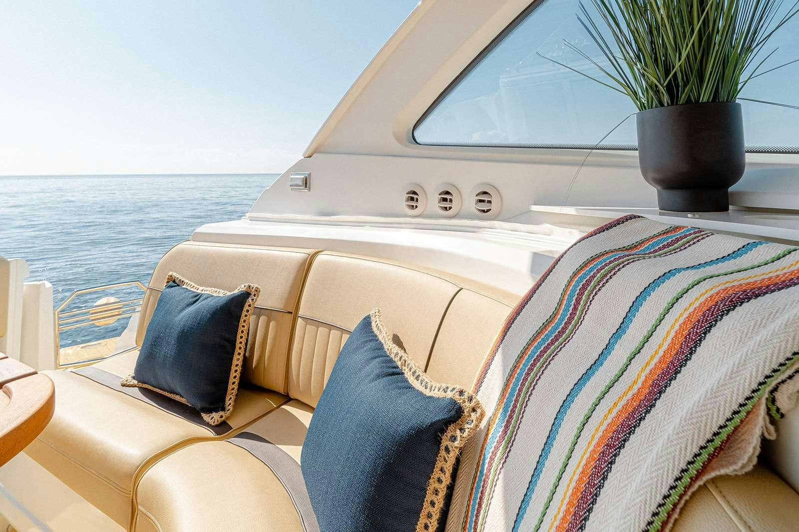 a boat with pillows on it aboard EPIC Yacht for Charter