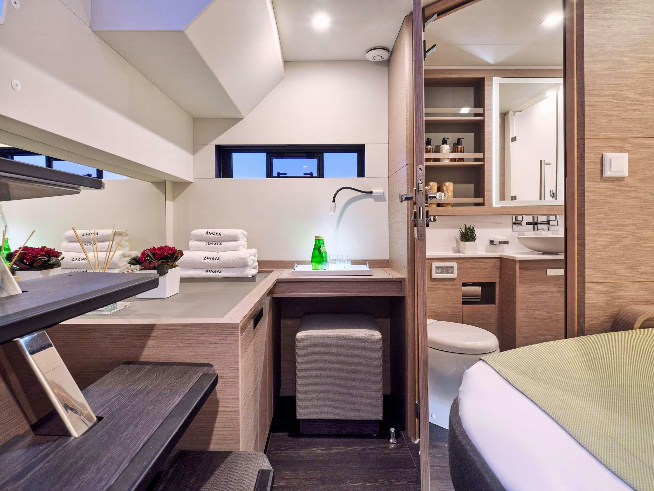 a bathroom with a sink and a toilet aboard APHAEA Yacht for Charter