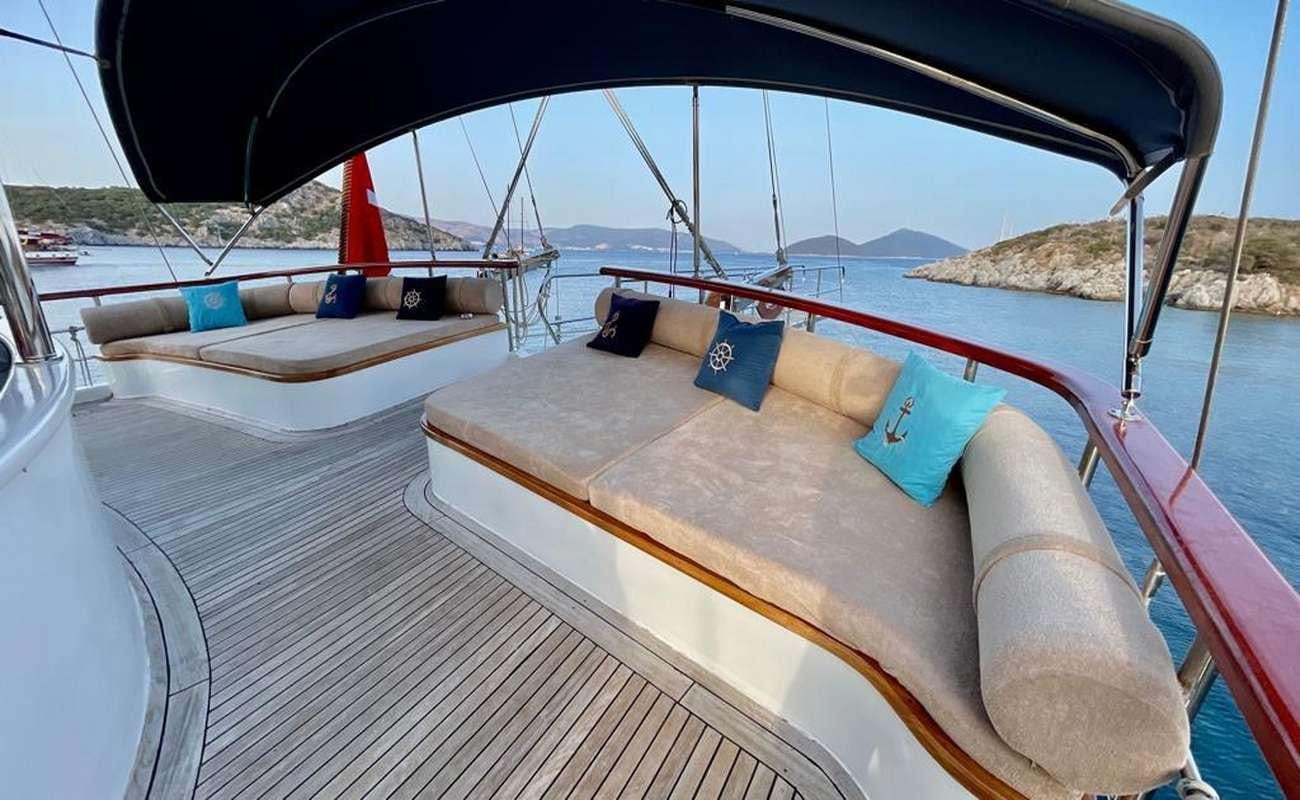 a boat on the water aboard QUESTA E VITA Yacht for Charter