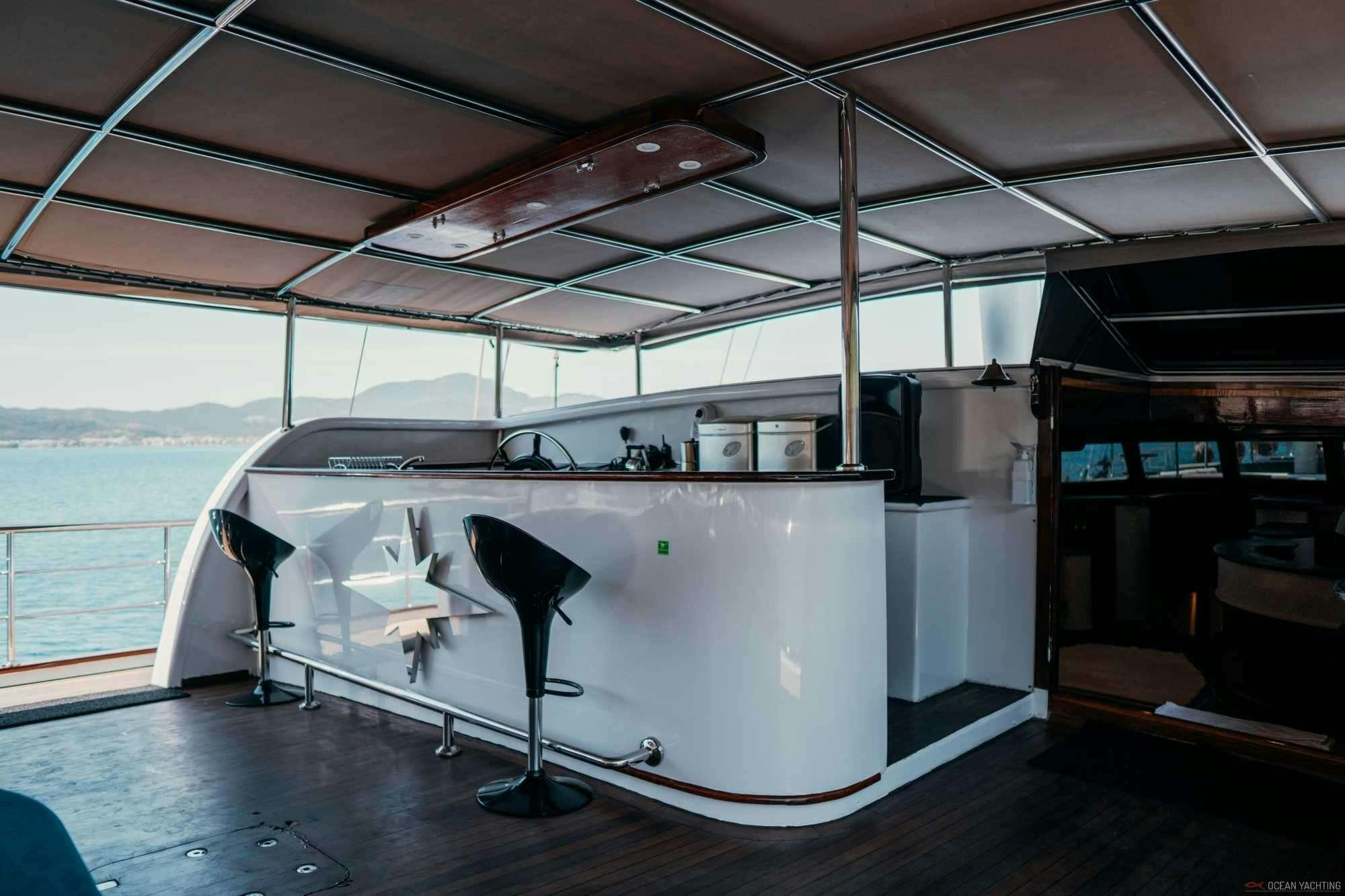 a large white rectangular object with a black object on top aboard NEVRA QUEEN Yacht for Charter