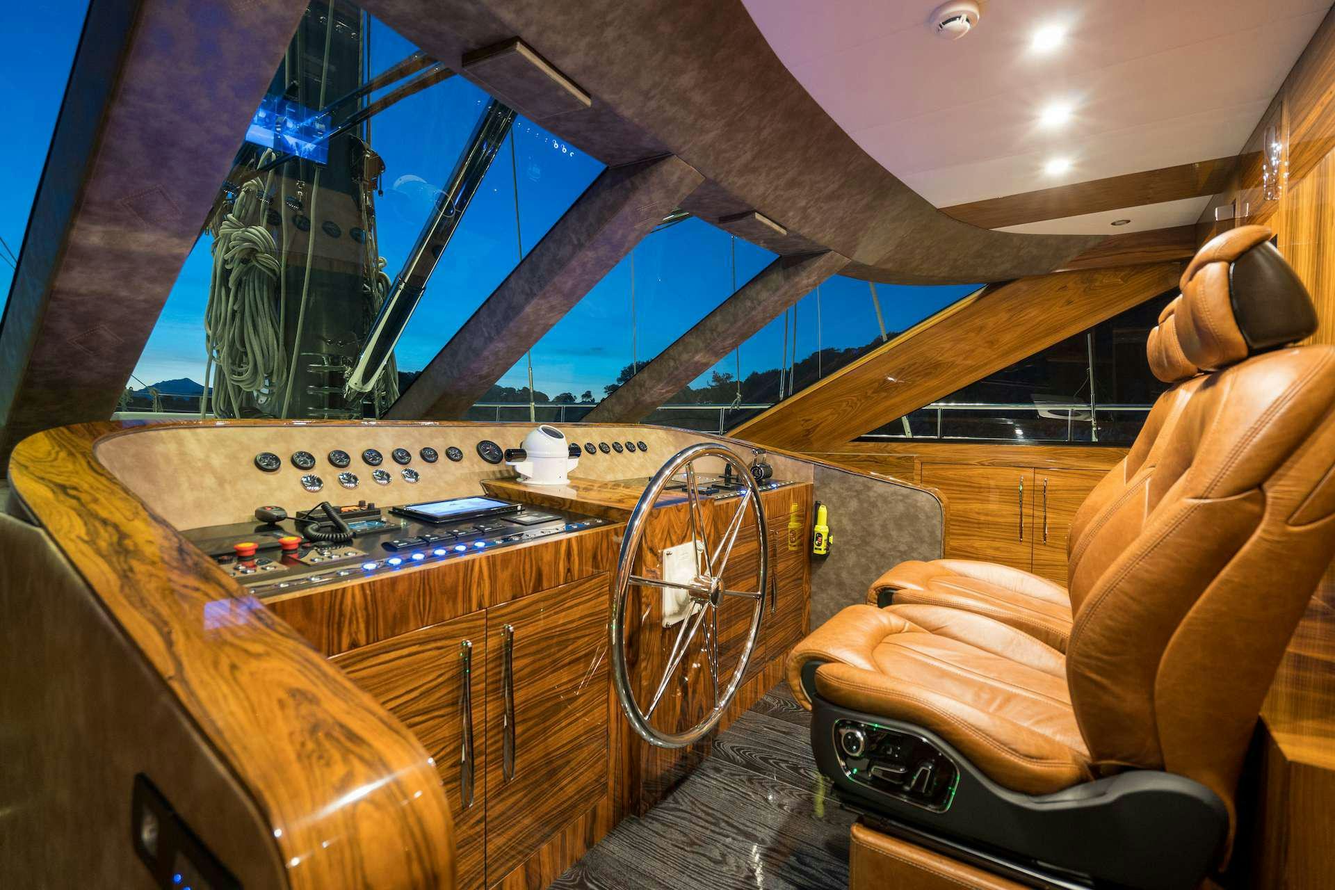 a wooden boat with a large wooden boat in the water aboard LONG ISLAND Yacht for Charter