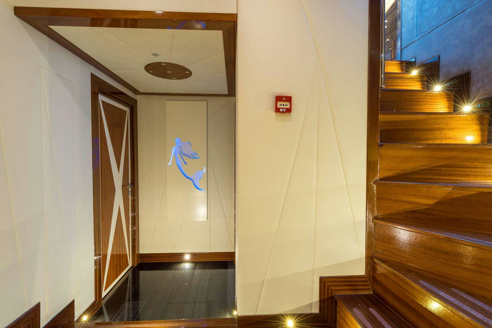 a hallway with a glass door aboard LONG ISLAND Yacht for Charter