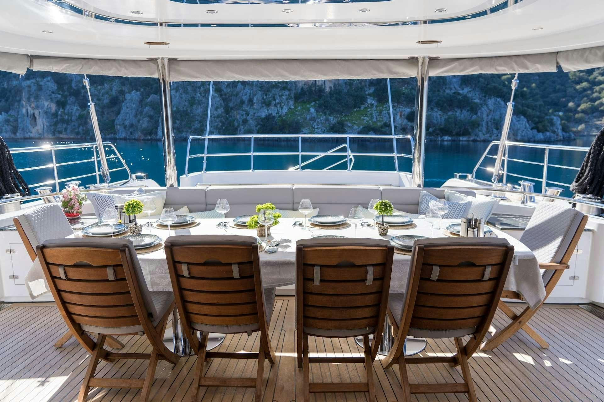 a table set for a dinner aboard LONG ISLAND Yacht for Charter