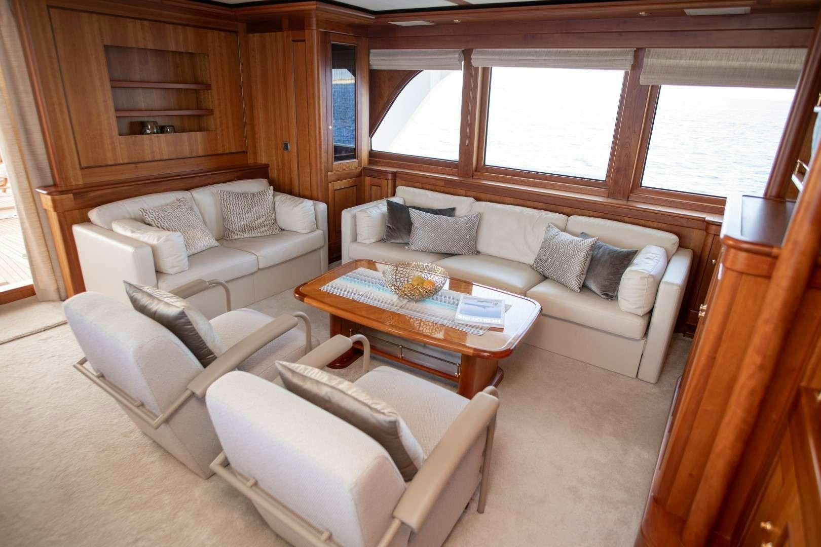 a living room with a couch and a table aboard SEA BREEZE II Yacht for Charter