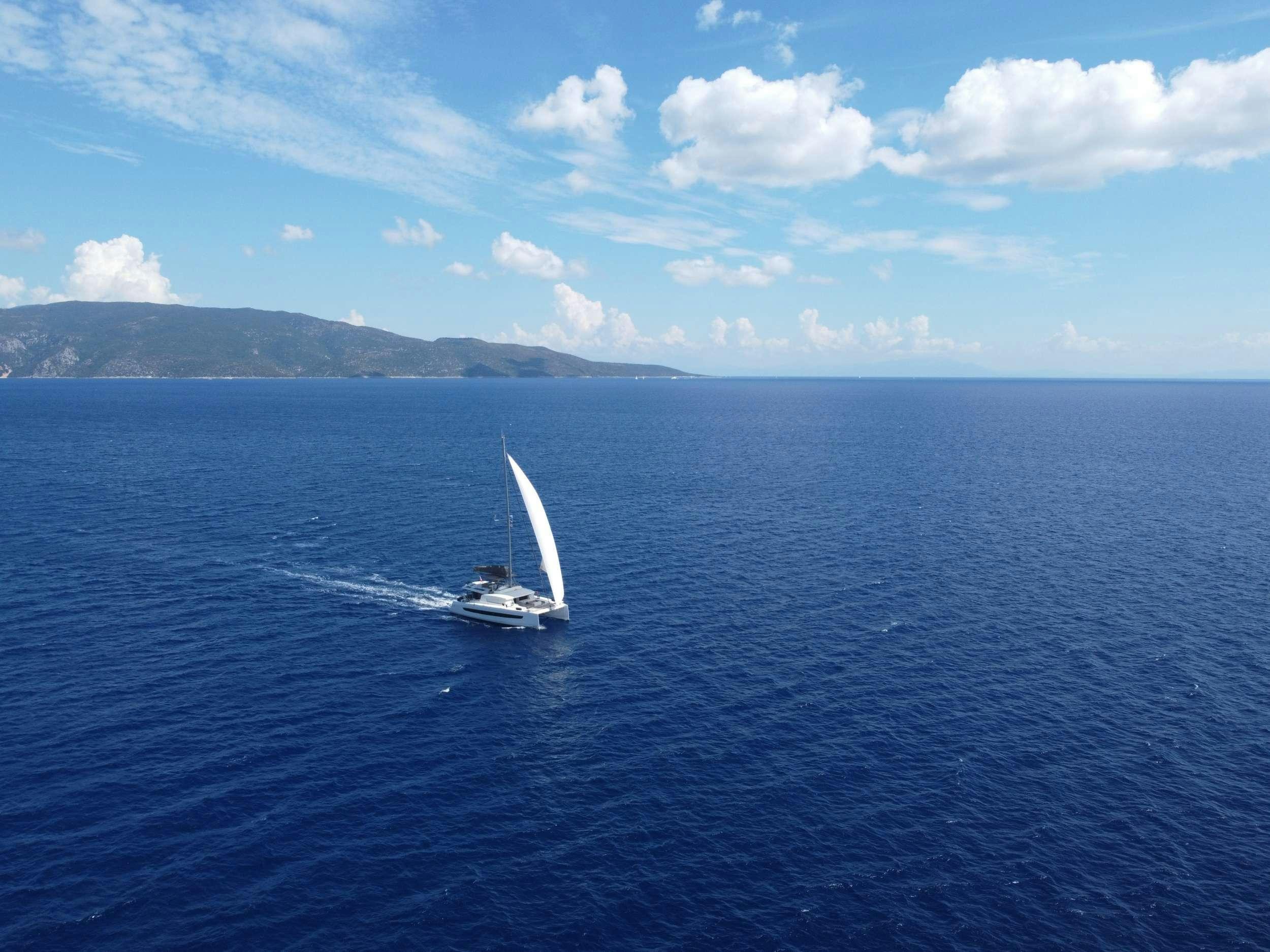 a couple of boats on the water aboard ANNA PINK Yacht for Charter