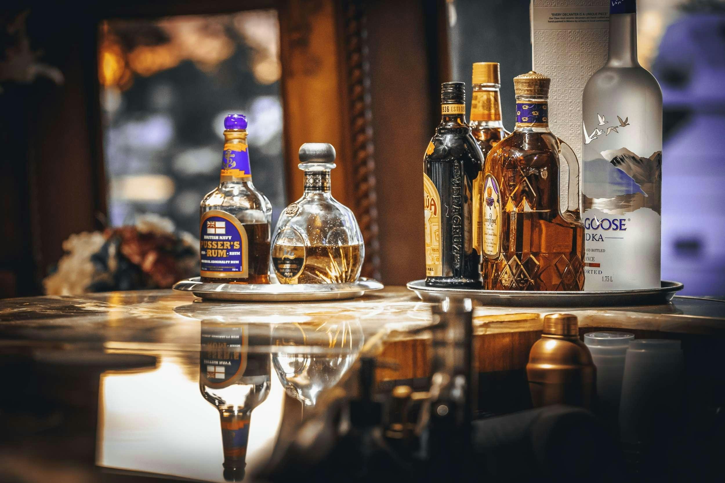 a group of bottles on a table aboard READY II PLAY Yacht for Charter
