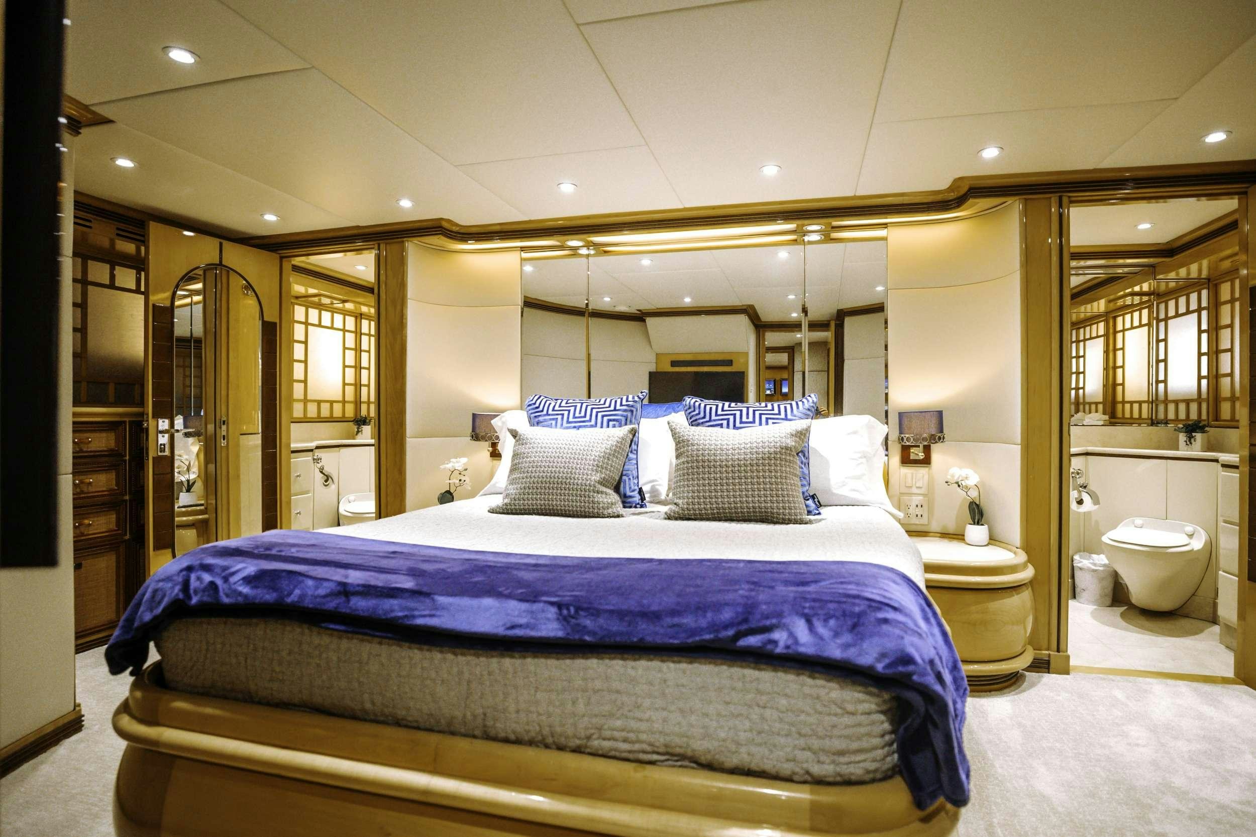a large bed in a bathroom aboard READY II PLAY Yacht for Charter