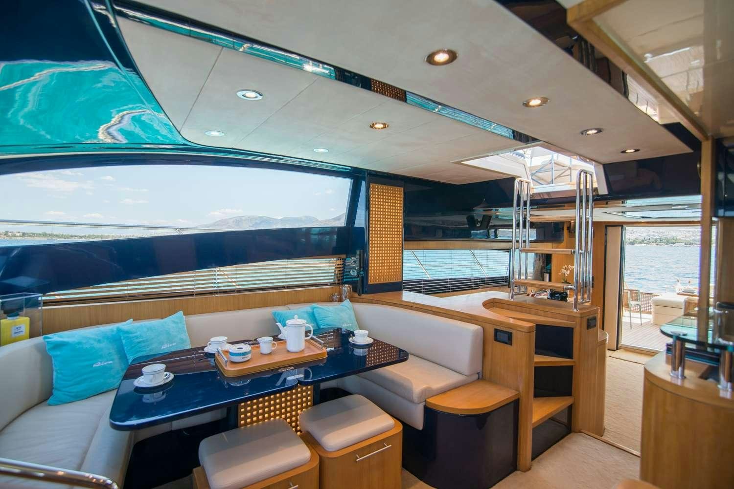 a room with a bed and a table aboard ANTAMAR II Yacht for Charter