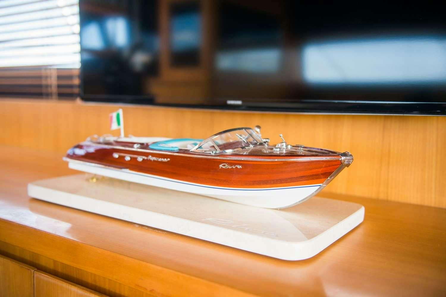 a model of a space ship on a table aboard ANTAMAR II Yacht for Charter