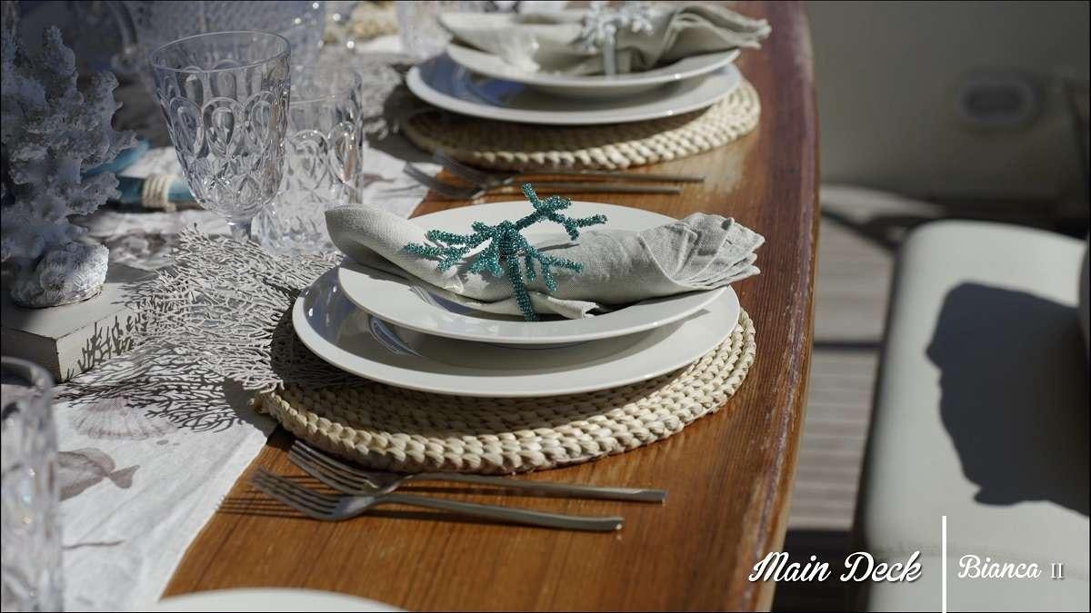 a plate with a bird on it aboard BIANCA II Yacht for Charter