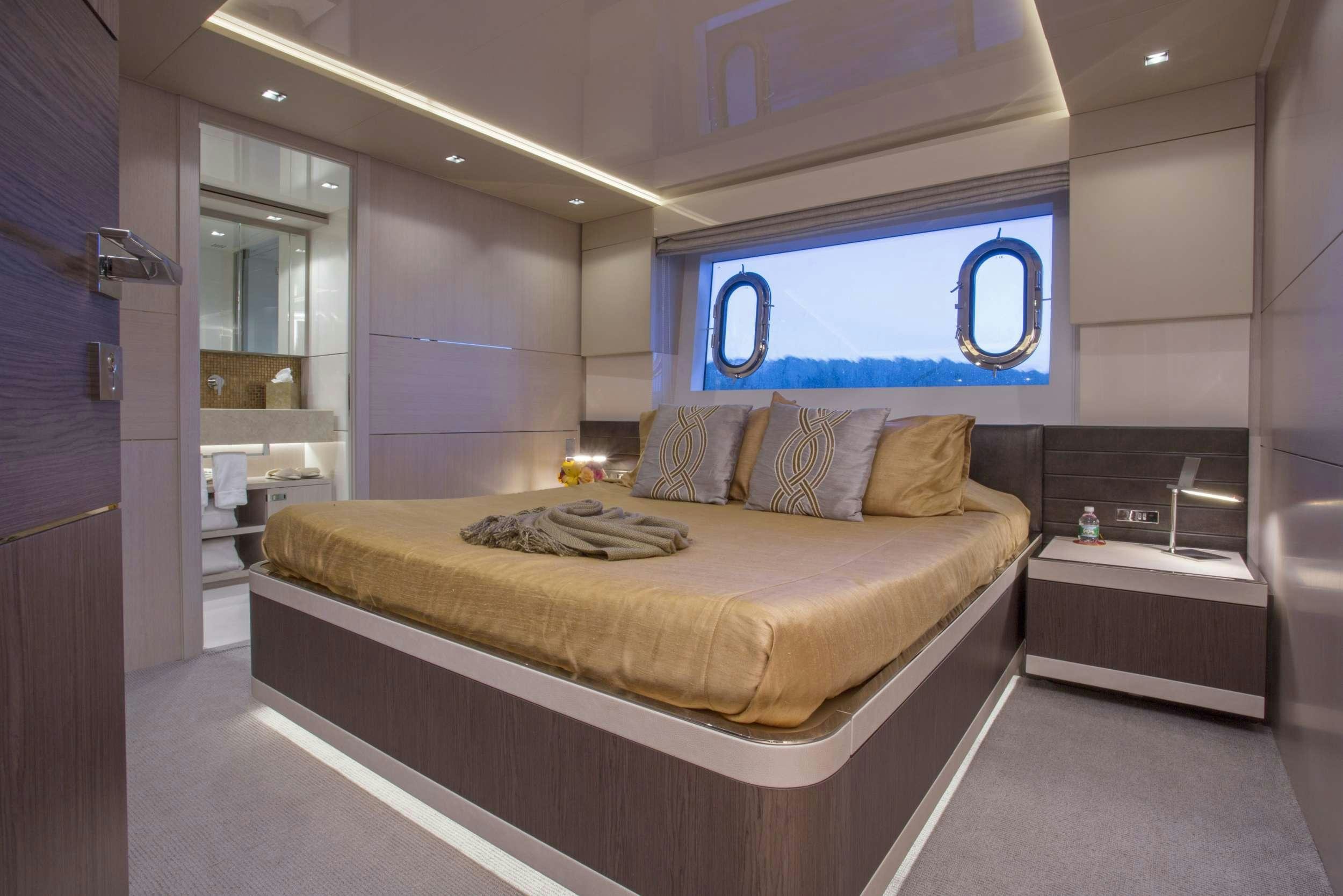 a bed in a room aboard ALANDREA Yacht for Charter