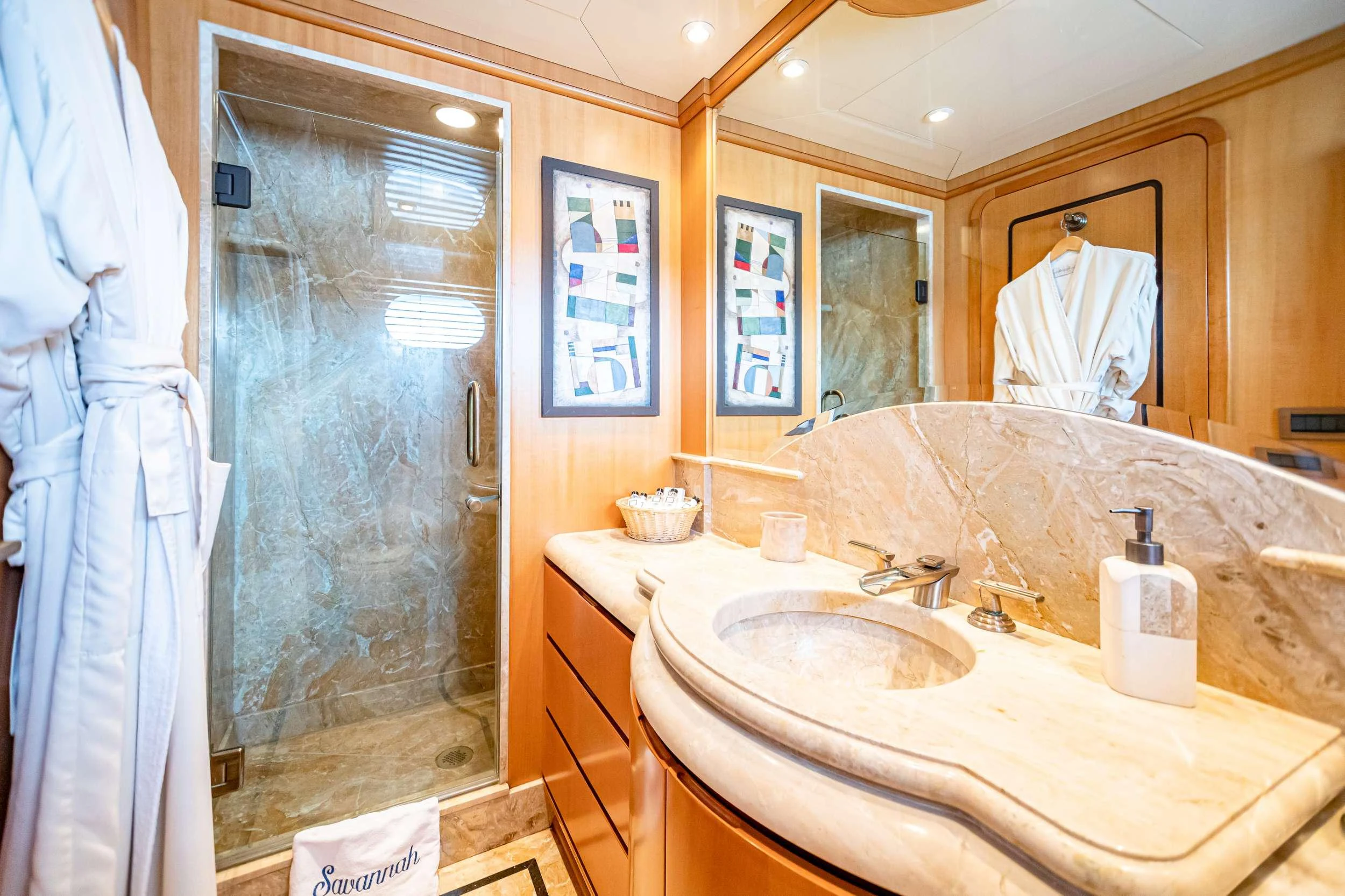 a bathroom with a sink and a shower aboard XOXO (118') Yacht for Charter