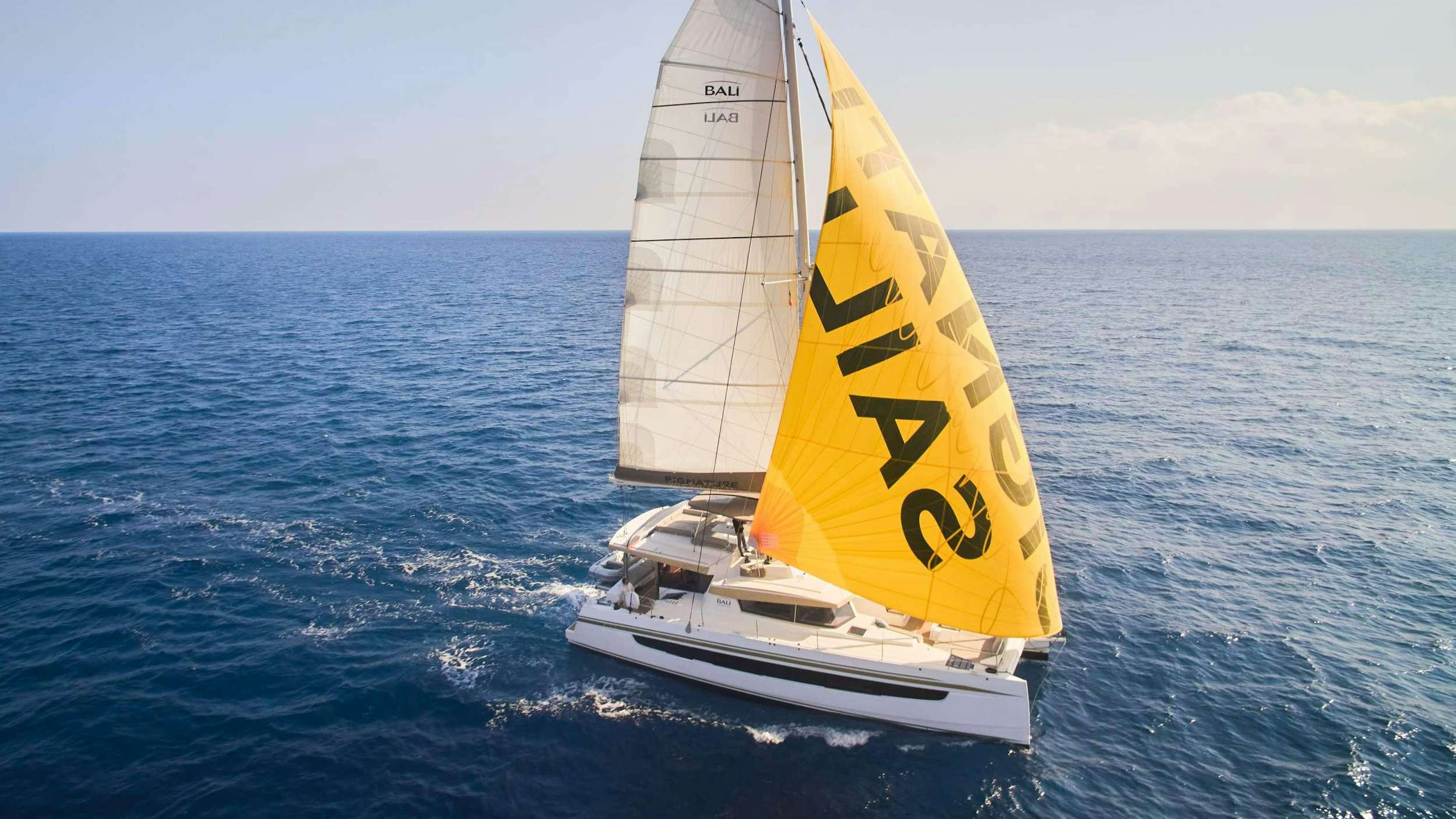a sailboat in the ocean aboard SIGNATURE CONCEPT Yacht for Charter