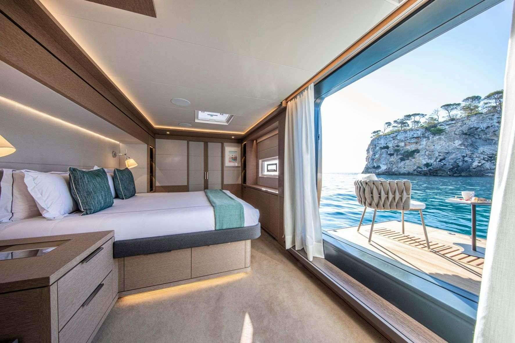 a large bed in a room aboard SASTA Yacht for Charter