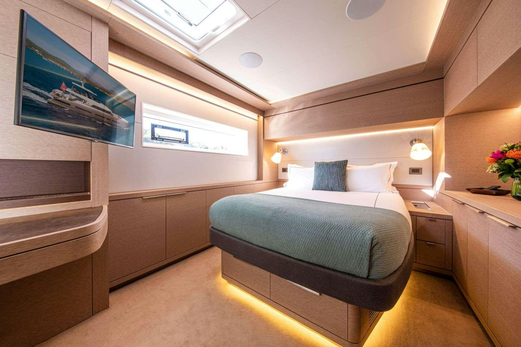 a bed in a room aboard SASTA Yacht for Charter