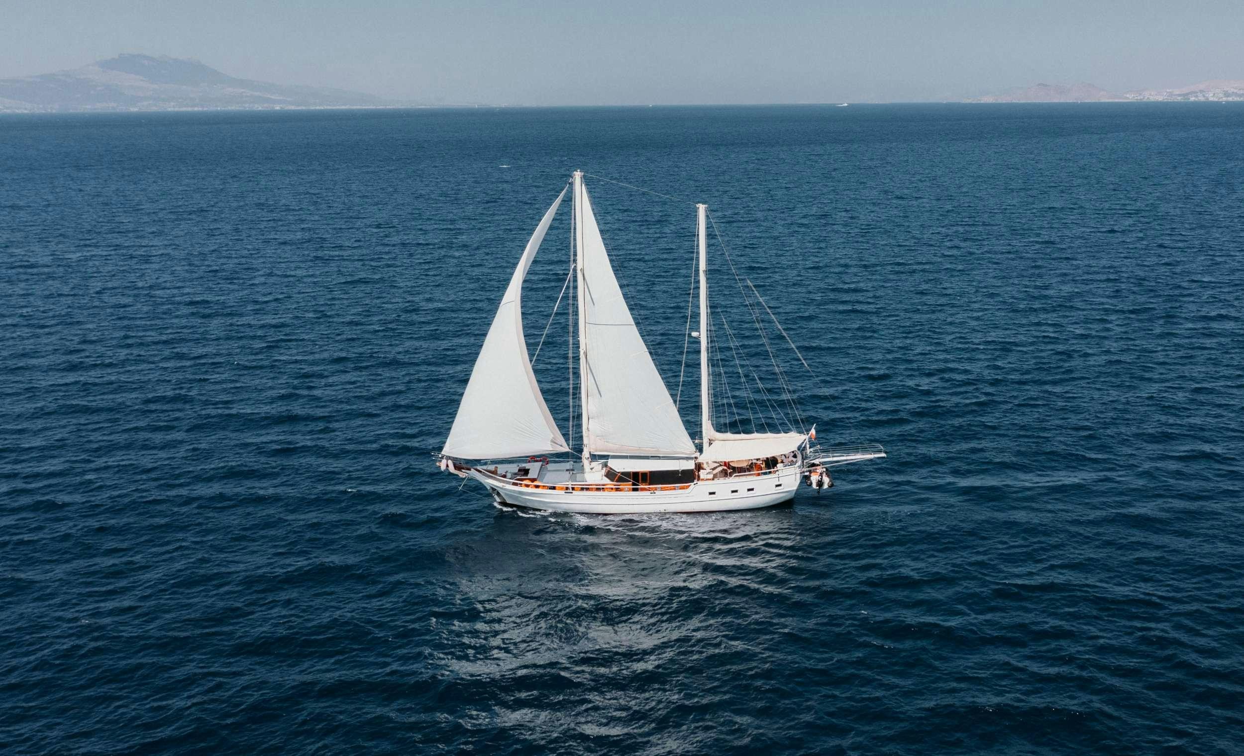 a sailboat in the water aboard BEYAZ LALE Yacht for Charter