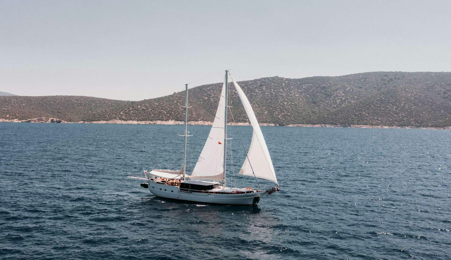 a sailboat on the water aboard BEYAZ LALE Yacht for Charter
