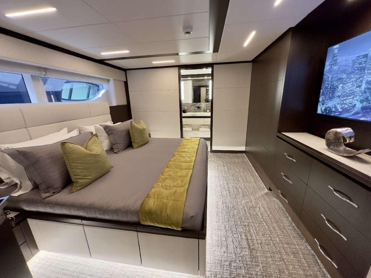 a bed in a room aboard ROMEO FOXTROT Yacht for Charter