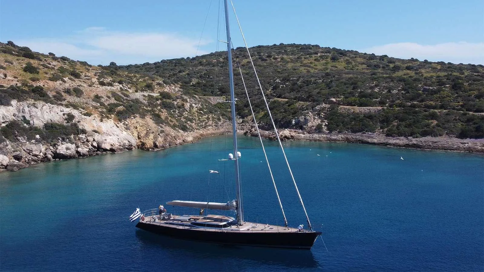 a boat sailing on the water aboard BLACK LION Yacht for Charter