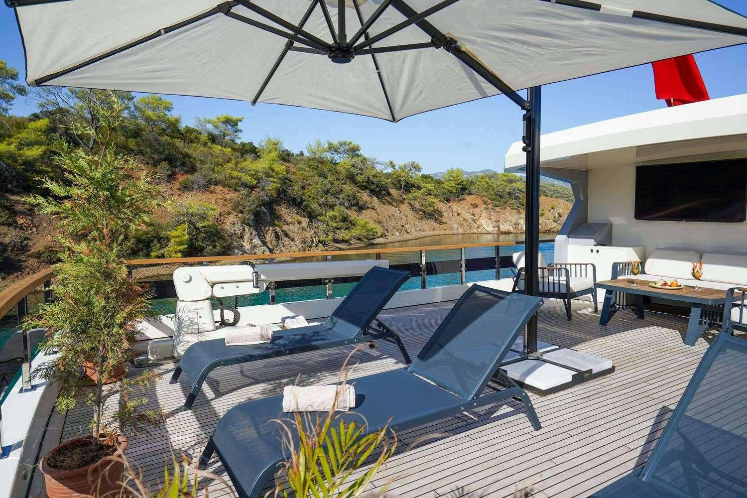 a large swimming pool aboard CINAR YILDIZI Yacht for Charter