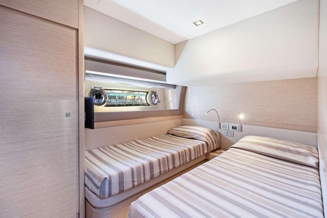 a couple of beds in a room aboard LINDY LOU Yacht for Charter